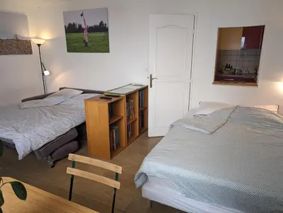 Un ou plusieurs lits dans un hébergement de l'établissement Large studio with terrace for up to 4 people
