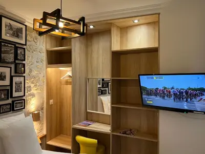 Télévision ou salle de divertissement dans l'établissement Cosy appartement à 500m de Montmartre