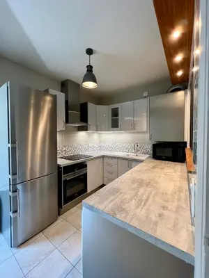 Cuisine ou kitchenette dans l'établissement Spacious & modern flat close to Parc Monceau