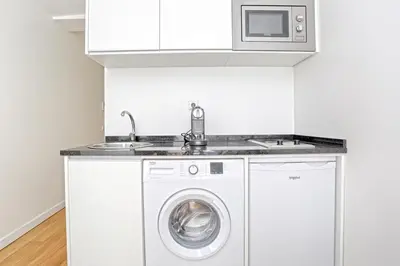 Cuisine ou kitchenette dans l'établissement Ciseaux 4F - Studio in Saint Germain des Prés