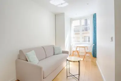 Coin salon dans l'établissement Ciseaux 4F - Studio in Saint Germain des Prés