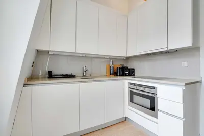 Cuisine ou kitchenette dans l'établissement Charming 2BR - 5P - Eiffel Tower - Trocadero