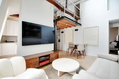 Télévision ou salle de divertissement dans l'établissement Charming 2BR - 5P - Eiffel Tower - Trocadero