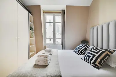 Un ou plusieurs lits dans un hébergement de l'établissement Charming 2BR - 5P - Eiffel Tower - Trocadero