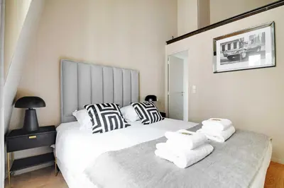 Un ou plusieurs lits dans un hébergement de l'établissement Charming 2BR - 5P - Eiffel Tower - Trocadero