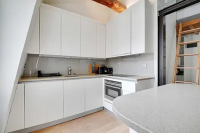 Cuisine ou kitchenette dans l'établissement Charming 2BR - 5P - Eiffel Tower - Trocadero