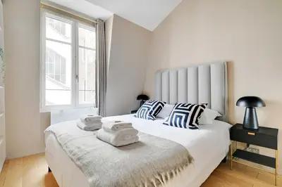 Un ou plusieurs lits dans un hébergement de l'établissement Charming 2BR - 5P - Eiffel Tower - Trocadero