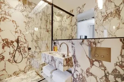 Salle de bains dans l'établissement TheLander - Serviced Apartments in Louvre - Rivoli