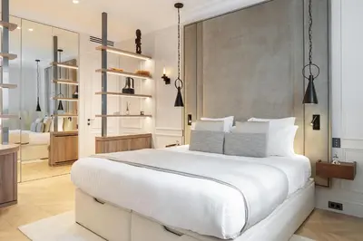 Un ou plusieurs lits dans un hébergement de l'établissement TheLander - Serviced Apartments in Louvre - Rivoli