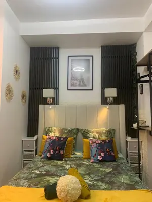 Un ou plusieurs lits dans un hébergement de l'établissement paris beautiful cozy studio