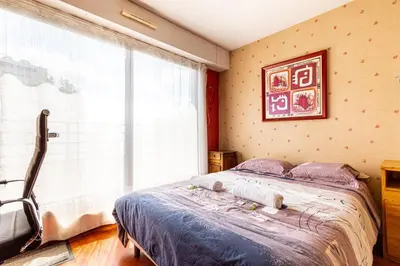 Un ou plusieurs lits dans un hébergement de l'établissement GuestReady - Duplex avec terrasse privée
