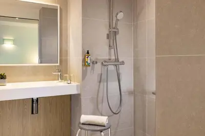 Salle de bains dans l'établissement Hotel Paris Louis Blanc