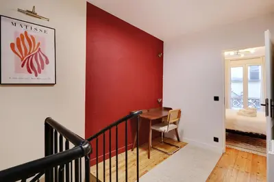 Un ou plusieurs lits dans un hébergement de l'établissement Pick A Flat's Apartment in Montmartre - Rue Drevet
