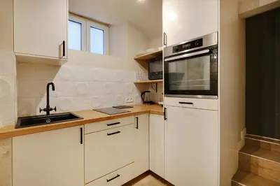 Cuisine ou kitchenette dans l'établissement Pick A Flat's Apartment in Montmartre - Rue Drevet