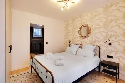 Un ou plusieurs lits dans un hébergement de l'établissement Pick A Flat's Apartment in Montmartre - Rue Drevet