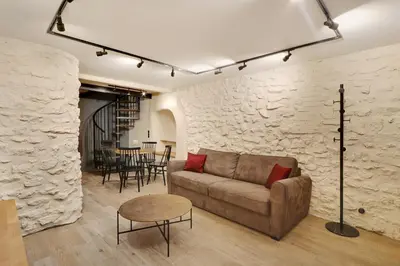 Coin salon dans l'établissement Pick A Flat's Apartment in Montmartre - Rue Drevet