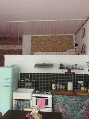 Cuisine ou kitchenette dans l'établissement Warm and cosy Loft in paris with a private outdoor