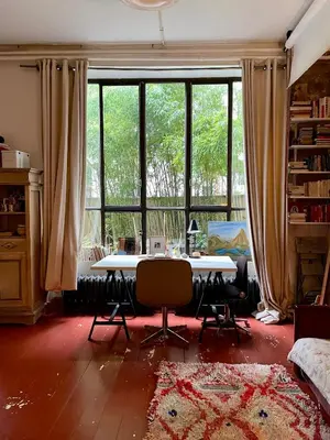 Coin salon dans l'établissement Warm and cosy Loft in paris with a private outdoor