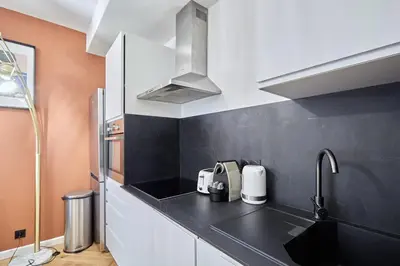 Cuisine ou kitchenette dans l'établissement Apartment Montmartre by Studio prestige