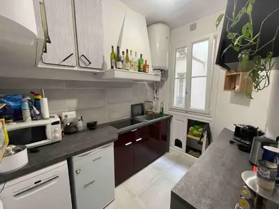 Cuisine ou kitchenette dans l'établissement L'authentique vie parisienne