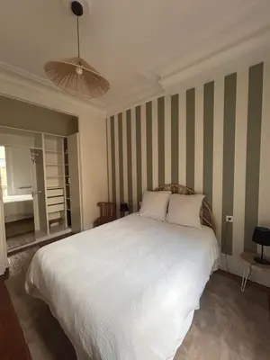 Un ou plusieurs lits dans un hébergement de l'établissement Logement Paris Centre - Amazing Flat Saint Martin