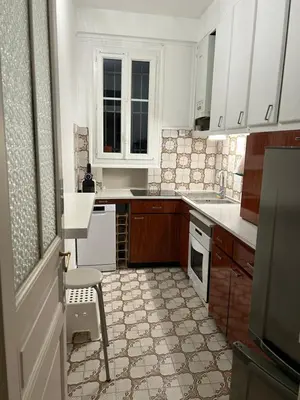 Cuisine ou kitchenette dans l'établissement Logement Paris Centre - Amazing Flat Saint Martin