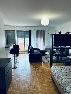 Un ou plusieurs lits dans un hébergement de l'établissement Bel appart de 45m2 à courbevoie