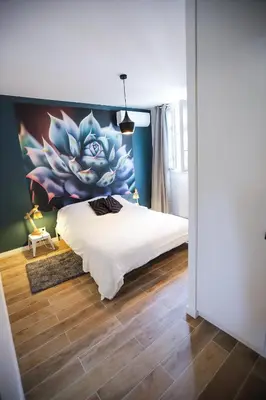 Un ou plusieurs lits dans un hébergement de l'établissement Elégant appartement parisien