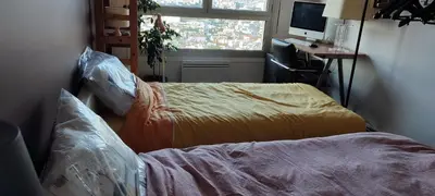 Un ou plusieurs lits dans un hébergement de l'établissement Full apt - Top floor - Eiffel Tower Panoramic View