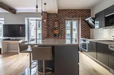 Cuisine ou kitchenette dans l'établissement Stay In a prime location Paris