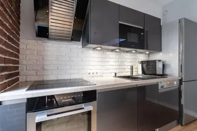 Cuisine ou kitchenette dans l'établissement Stay In a prime location Paris
