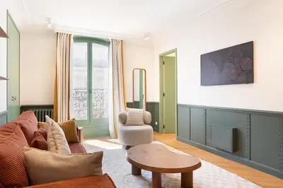 Coin salon dans l'établissement Paris Home Collection Serviced Apartments in Opéra - Rue Saint-Lazare