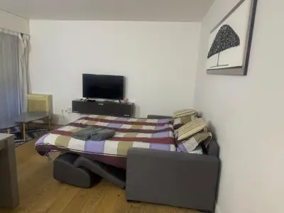 Télévision ou salle de divertissement dans l'établissement Appart Champs Élysée bagatelle - 4 pers