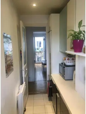 Cuisine ou kitchenette dans l'établissement Charmant appartement à Montmartre