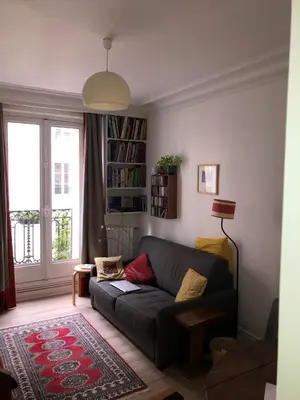 Coin salon dans l'établissement Nice and practical apartment to enjoy Paris close to Montmartre