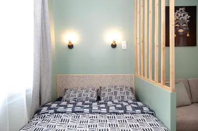 Un ou plusieurs lits dans un hébergement de l'établissement Studio cozy, proche paris