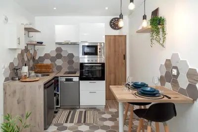 Cuisine ou kitchenette dans l'établissement Studio cozy, proche paris