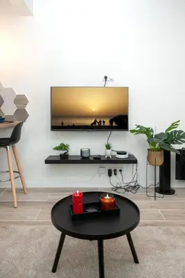 Télévision ou salle de divertissement dans l'établissement Studio cozy, proche paris