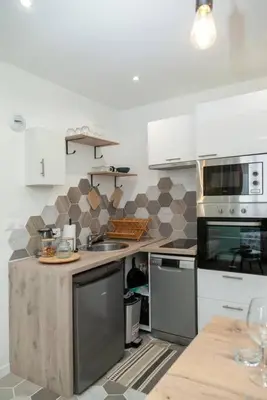 Cuisine ou kitchenette dans l'établissement Studio cozy, proche paris