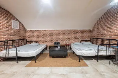 Un ou plusieurs lits dans un hébergement de l'établissement Appartement 2 étages Paris - Métro 9 Grands Boulevards - Folies Bergères