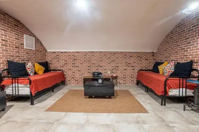 Coin salon dans l'établissement Appartement 2 étages Paris - Métro 9 Grands Boulevards - Folies Bergères