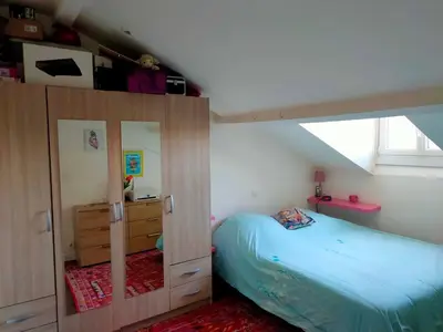 Un ou plusieurs lits dans un hébergement de l'établissement Charmant 2 pièces Clichy Levallois