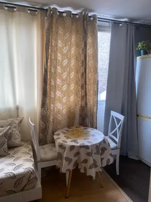 Coin salon dans l'établissement Cosy studio Paris Wagram