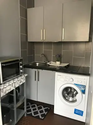 Cuisine ou kitchenette dans l'établissement Cosy studio Paris Wagram