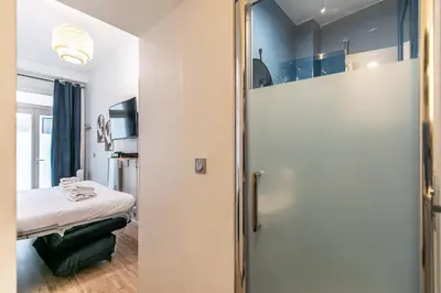 Un ou plusieurs lits dans un hébergement de l'établissement MBA Splendide Appart - Parmentier - Paris - Proche Bastille