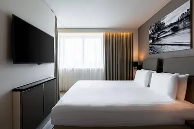Un ou plusieurs lits dans un hébergement de l'établissement AC Hotel Paris Porte Maillot by Marriott