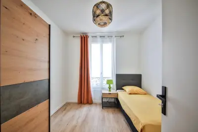 Un ou plusieurs lits dans un hébergement de l'établissement Lovely apartment for 6, Subway at 160m !