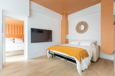 Un ou plusieurs lits dans un hébergement de l'établissement Rome Batignolles - Luxe Charme - 2P