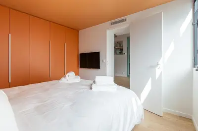 Un ou plusieurs lits dans un hébergement de l'établissement Rome Batignolles - Luxe Charme - 2P