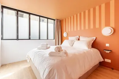 Un ou plusieurs lits dans un hébergement de l'établissement Rome Batignolles - Luxe Charme - 2P